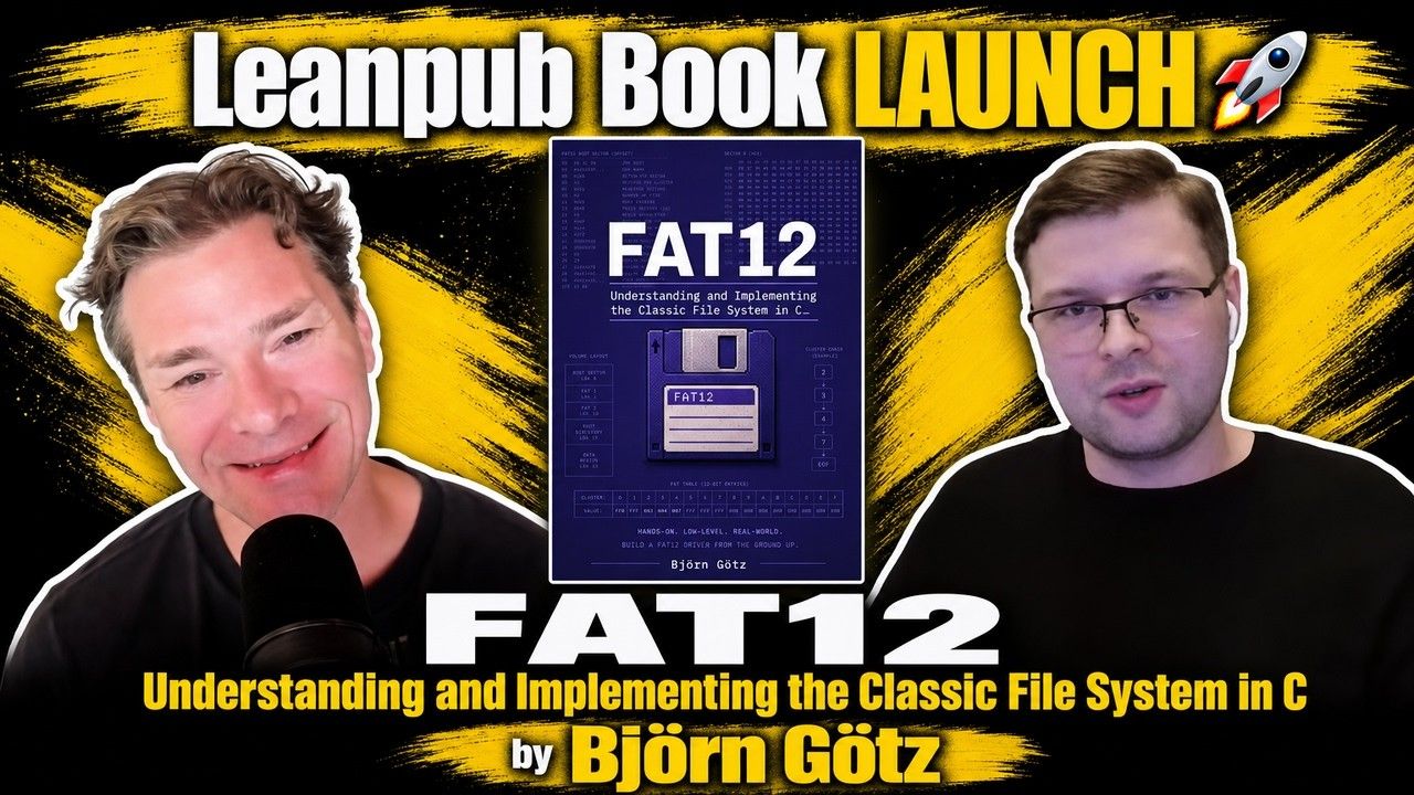 Leanpub Book Launch: FAT12 by Björn Götz, with Leanpub co-founder Len Epp and the author on either side of the book cover